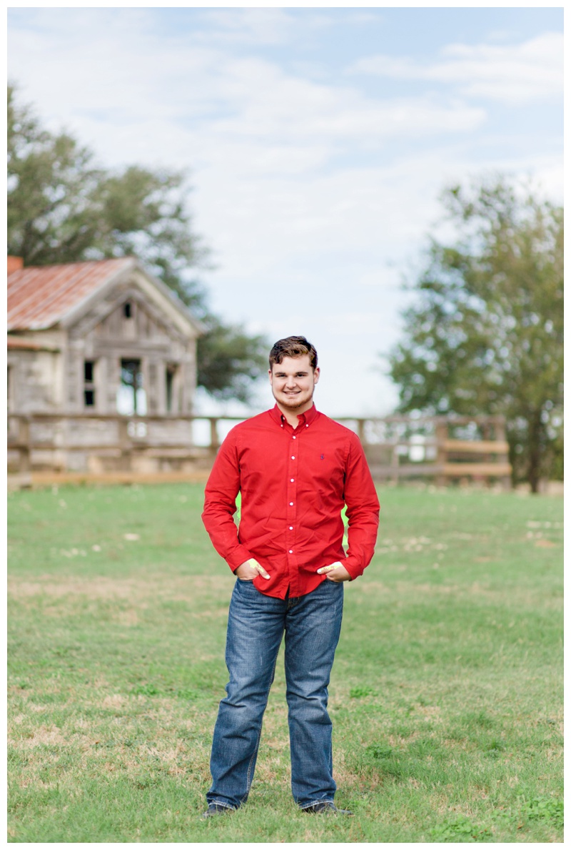 Guy Senior Portrait with barn at Berry Springs Park in Georgetown, Texas