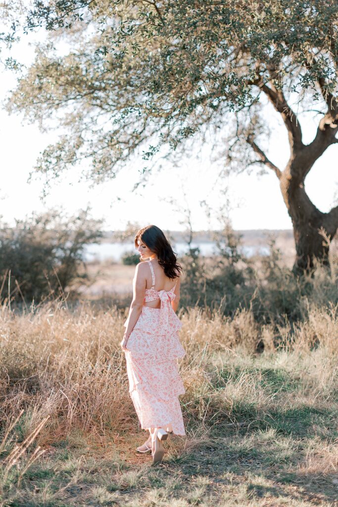 Malibu senior photo of girl in long dress in field at golden hour
