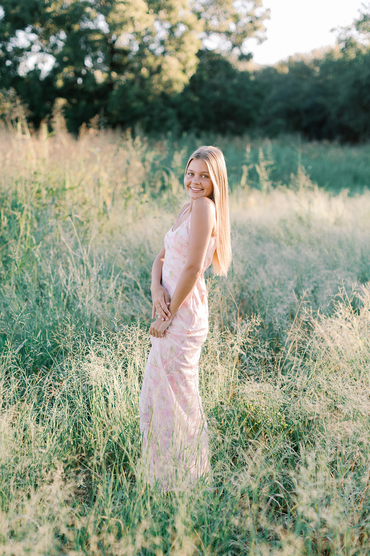 Senior photos Malibu Southern California field in golden sunset light