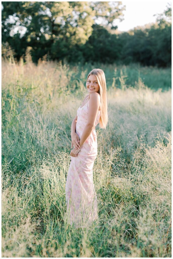 Senior photos Malibu Southern California field in golden sunset light