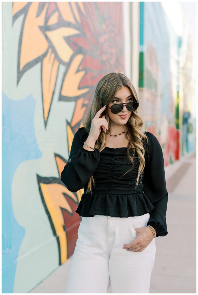 SoCal Urban senior photo backdrop with bold wall or clean architecture