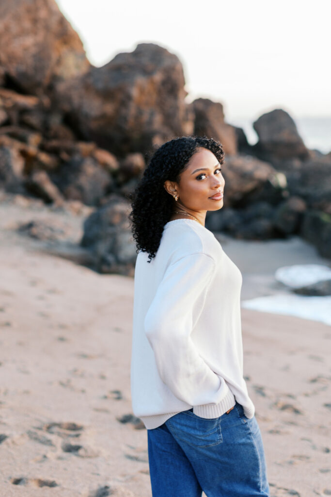 Oaks Christian senior photos at Point Dume Malibu with rocky coastline and ocean backdrop
